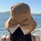 👒✨JETZT 50 % RABATT! ✨ Damen Sonnenhut mit breiter Krempe & dekorativer Schleife, faltbarer atmungsaktiver Stoff mit 360° UV-Schutz für Strand, Garten und Urlaub ✨